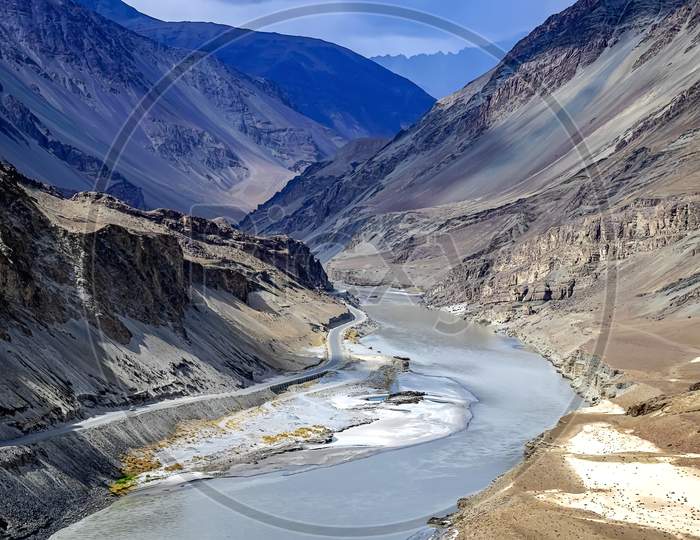 The confluence of the Zanskar River (from top) and the Indus (bottom flowing from left to right) is 3 km southeast of Nimmu village in Ladakh.