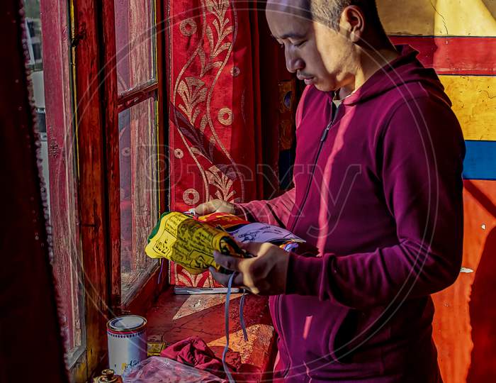 All Gelug sect Buddhist Monks young and old full-fill their assigned duties every day at Thiksey Monastery in Ladakh, India