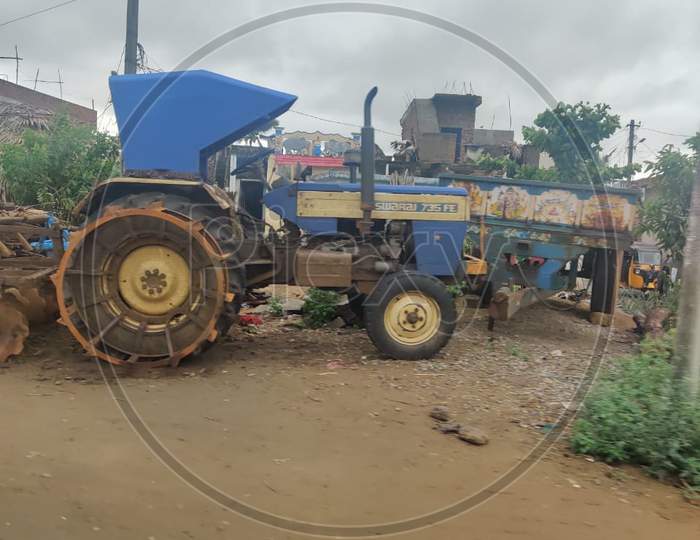 Indian tractor with attached equipment