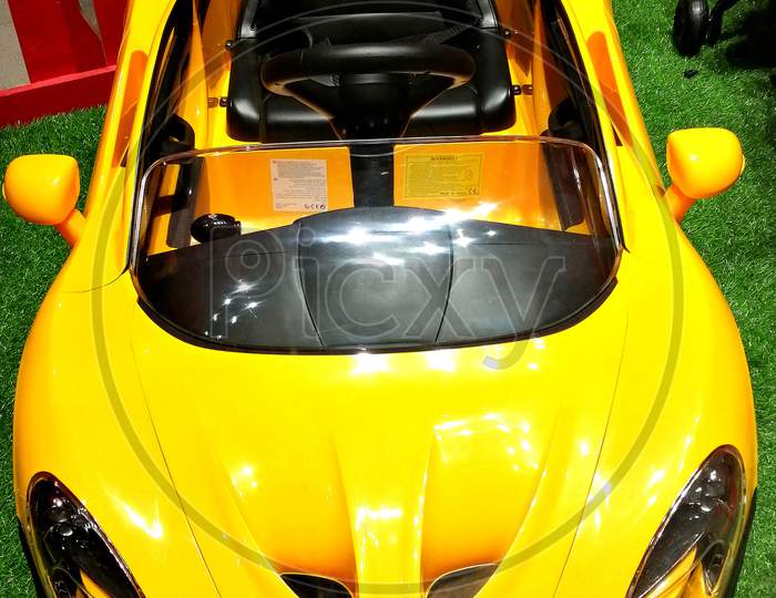 Yellow car, baby's toy, yellow lamborghini