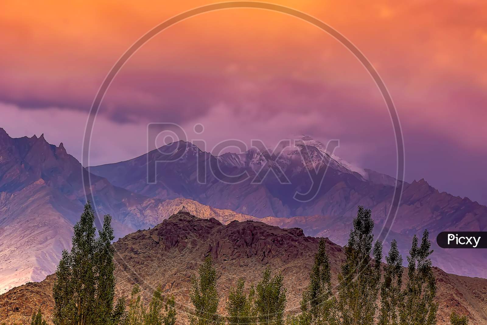 A beautiful red sunset overt the Himalayan Ladakh mountain range at Leh city.