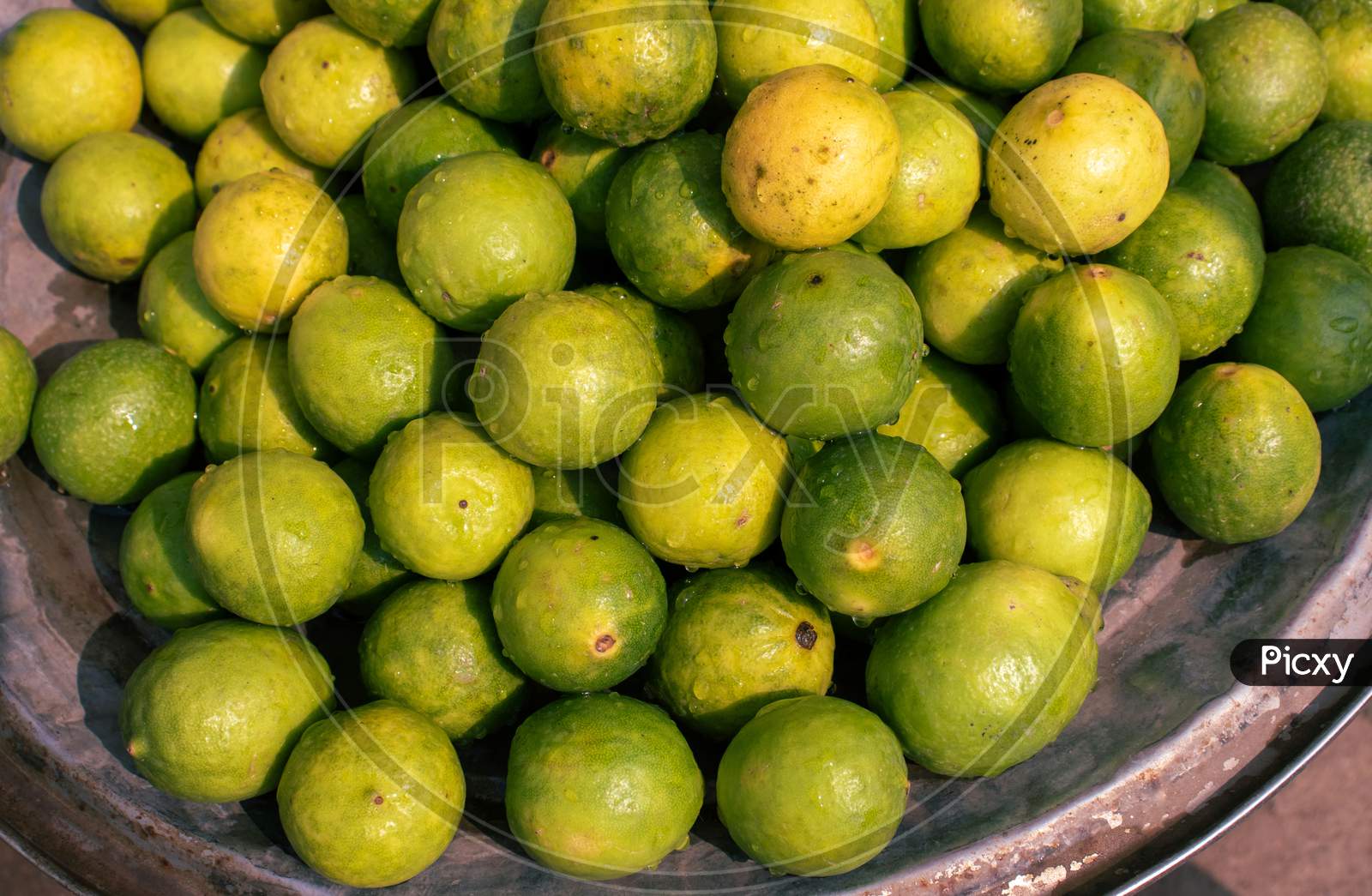 Stack Of Lemon Fruit In An Indian Vegetable Market For Selling