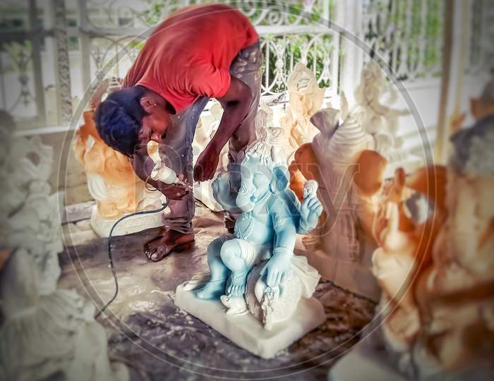 Lord Ganesha statue painting