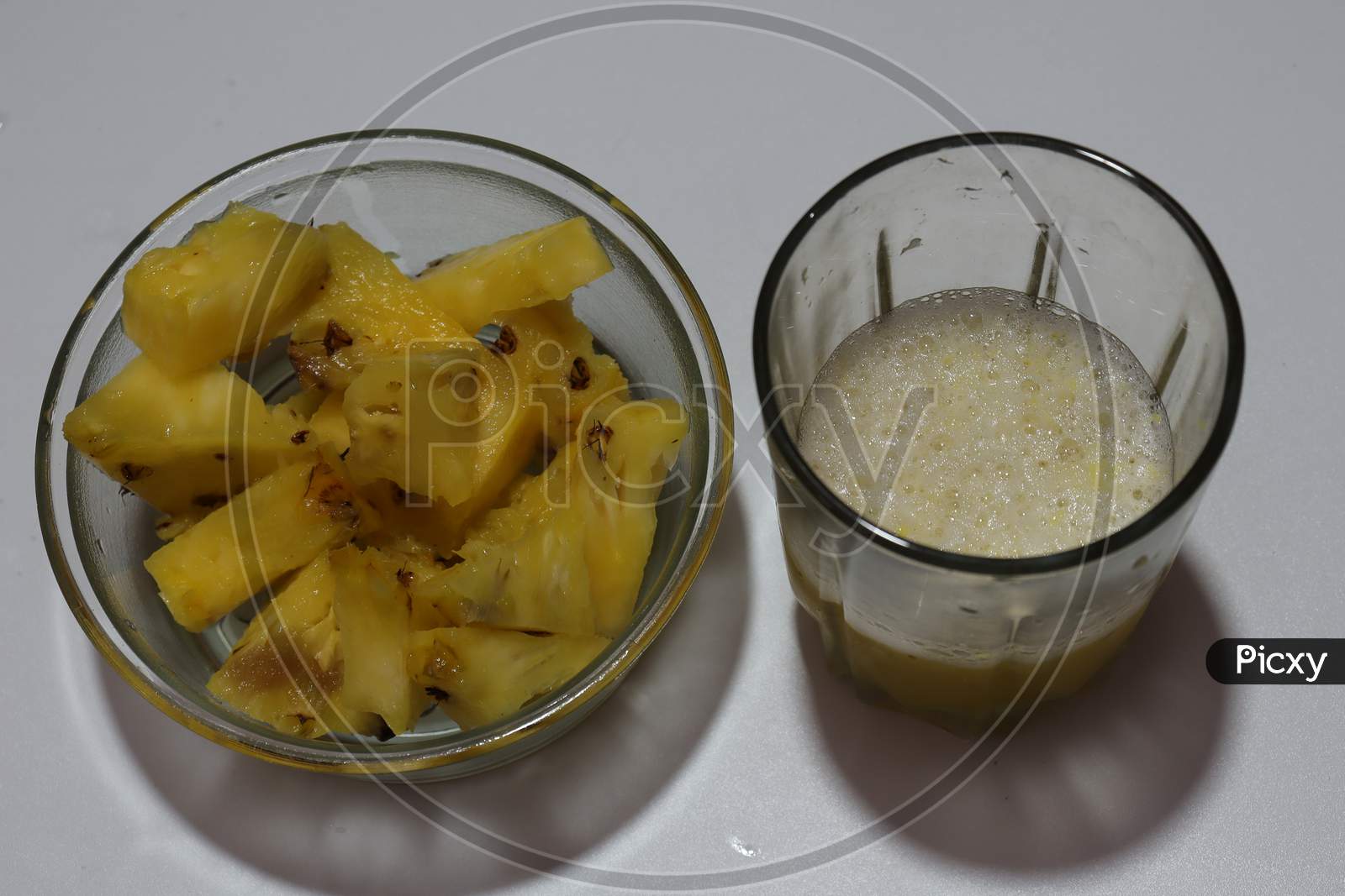 Fresh raw ripe fruit Pineapple slices isolated on white background