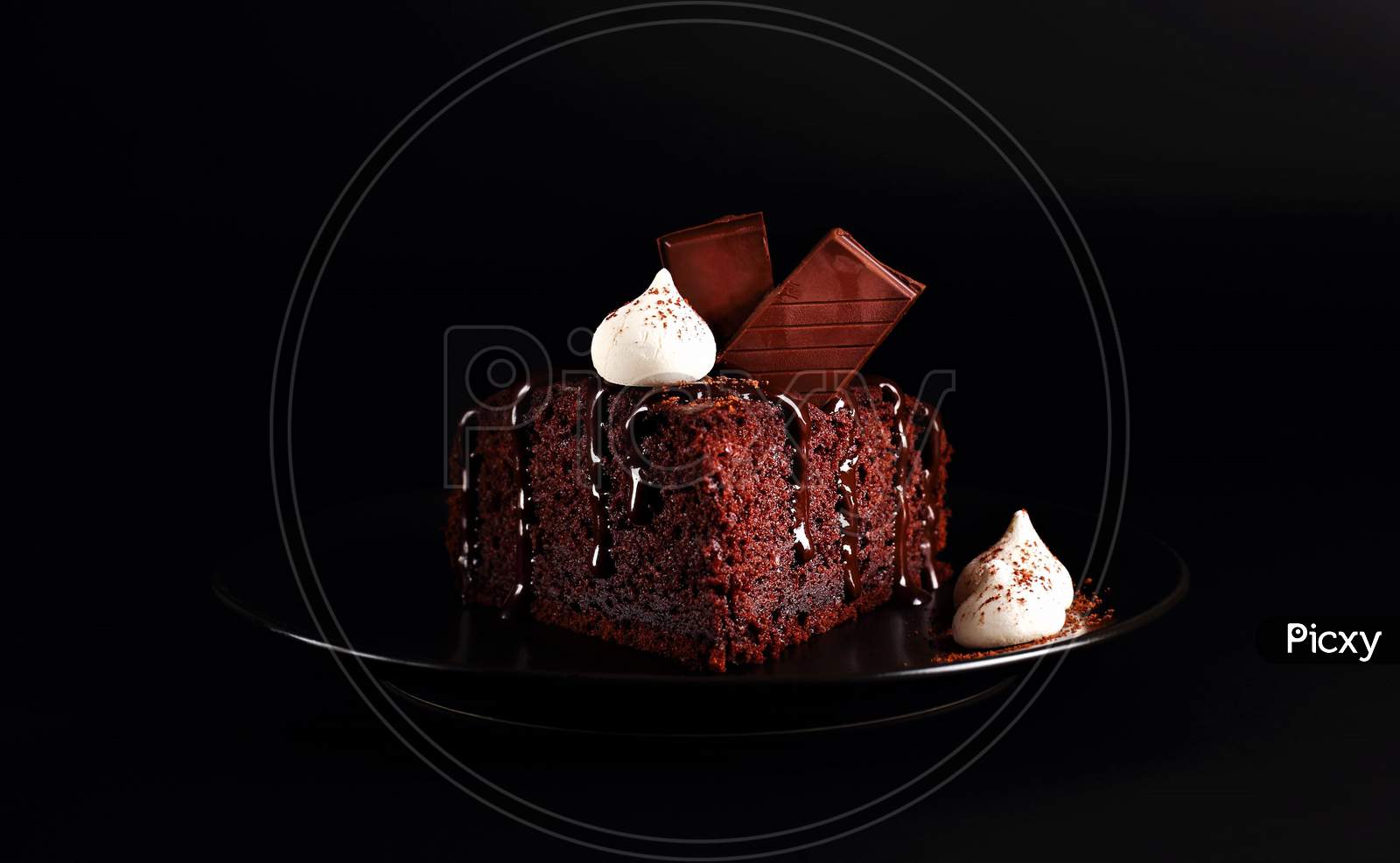 Chocolate Cakes On Black Background. Chocolate Cake Piece.