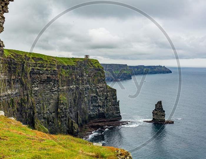 Stunning Irish Landscape Of The Cliffs Of Moher And The Branaunmore Sea Stack, Geosites And Geopark, Wild Atlantic Way, Wonderful Cloudy Spring Day In County Clare In Ireland