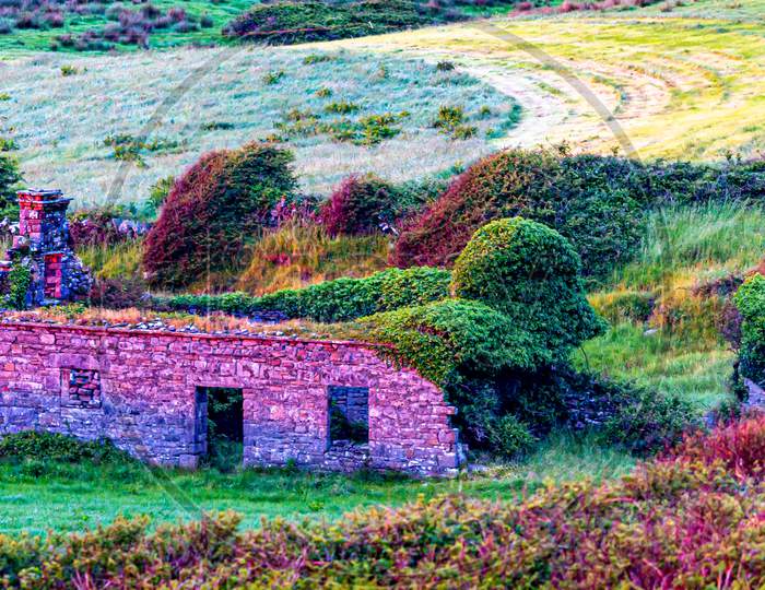 Beautiful Color Scheme By Sunset Over A Ruined House In The Meadow Near The Village Of Doolin, Wild Atlantic Way, Archaeological Sites In County Clare In Ireland