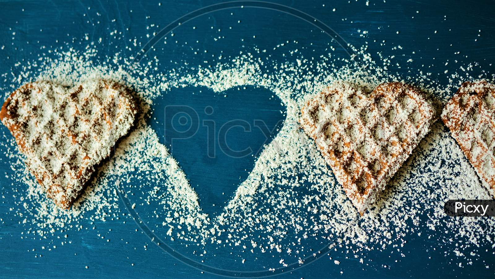 Pastry Waffles With Powdered For Sugar. Waffles Is Heart Shap Food 8K Image.