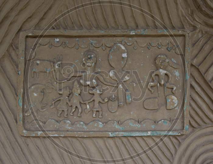 Antique Clay Designer On Wall
