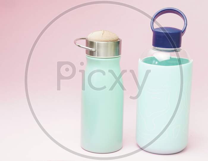 Reusable Thermos And Water Bottle On A Pink Background. Flat Lay Flat Lat Design Zero Waste Concept