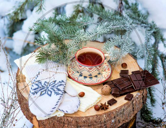 Christmas Party. Tea And Sweet Chocolate Bar On Table. Christmas Celebration With Sweet Food.