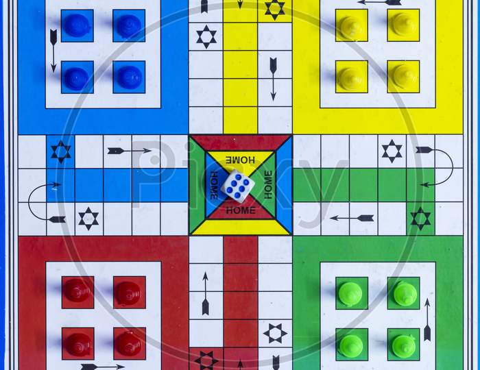 Top View Of A Ludo Game Board With Dice