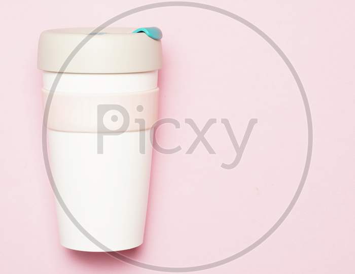 Takeaway Coffee Cup On Pink Background. Flat Lay.