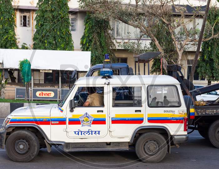 Police van of Mumbai police on road near Nariman point.