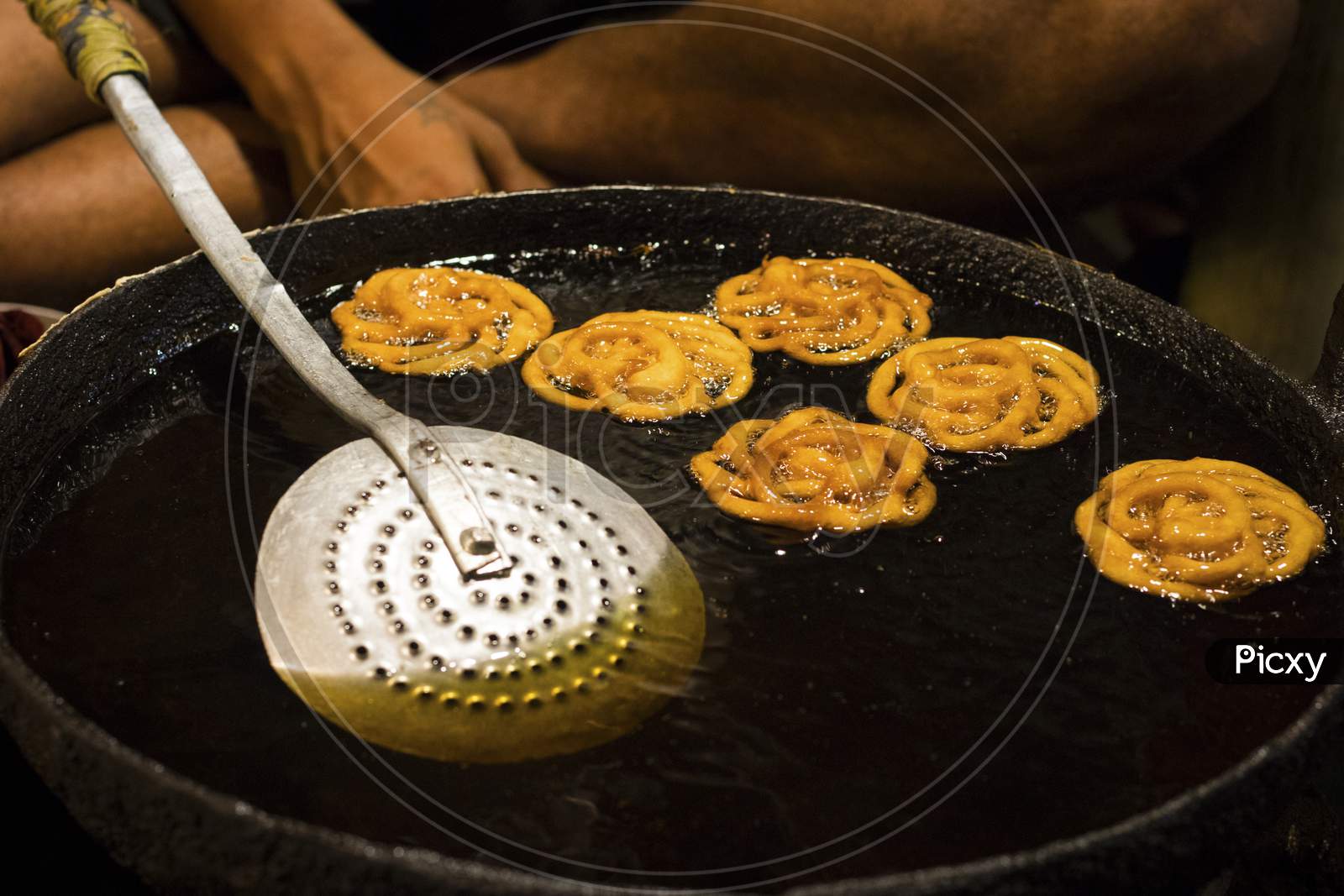 Jalebi is an Indian sweet and delicious food made of Maida flour and sugar syrup
