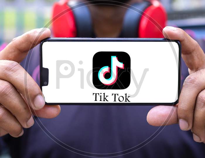 Tik Tok application icon on Smartphone screen close-up. TikTok application. Tiktok is a Social media network.