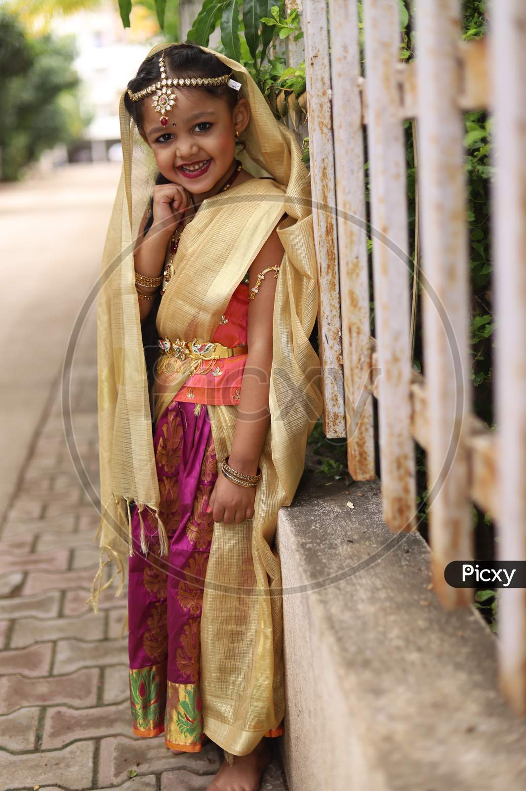 Cute littl girl dressed as Radha for celebrating janmasthmai