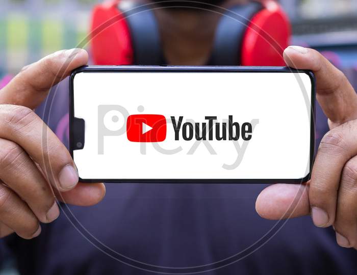 YouTube application icon on Smartphone screen close-up. Youtube application. YouTube is a Social media network to share videos.