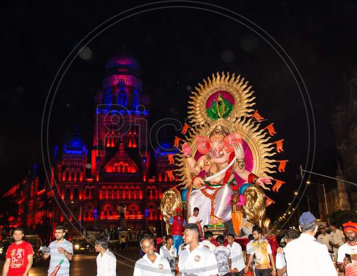 People celebrating Ganesh Chaturthi festival in Mumbai city, India.