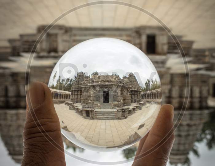 Hoysala temple seen through Lens Crystal ball at Somanathapura/Karnataka/India.