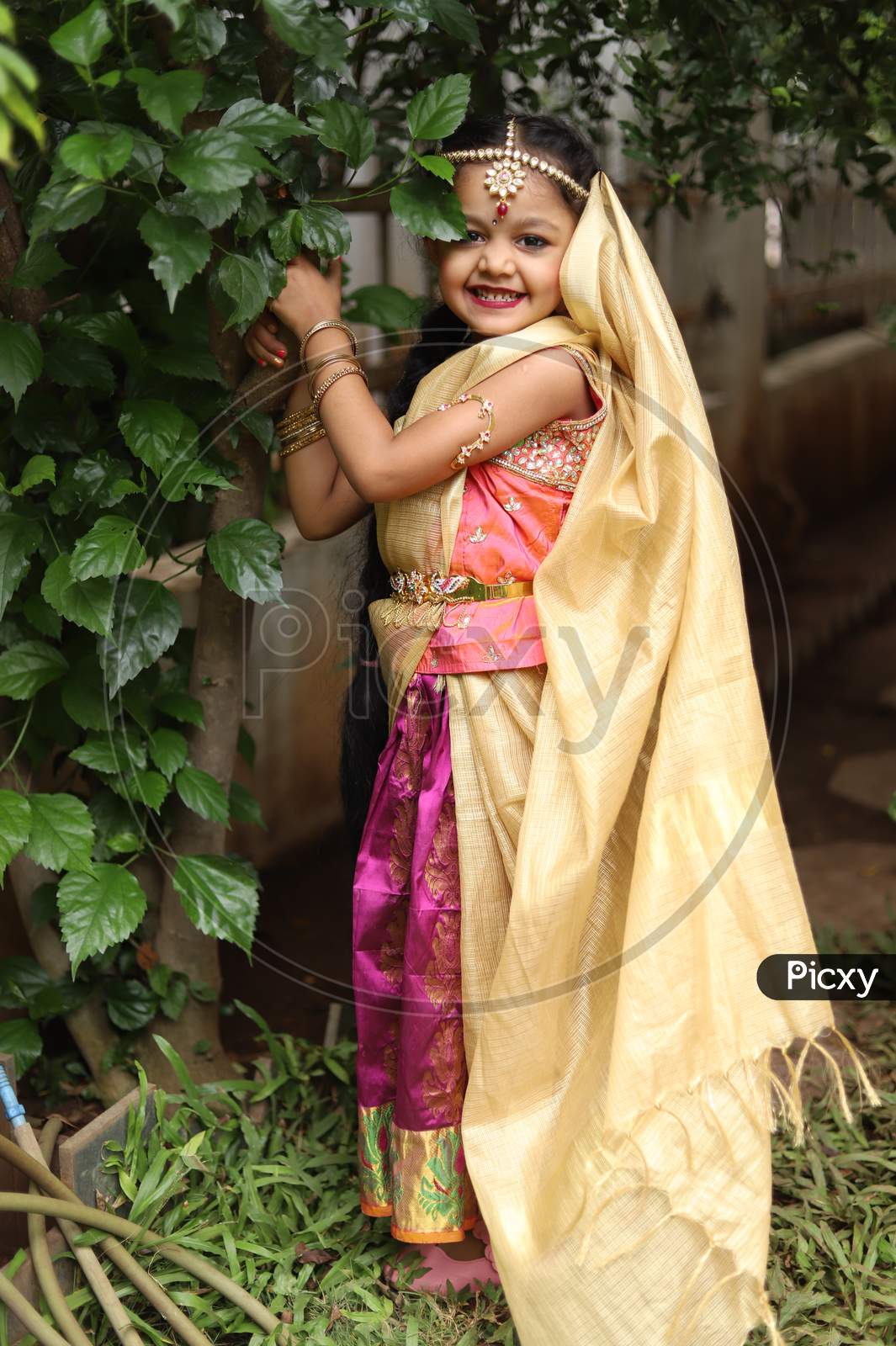 Cute littl girl dressed as Radha for celebrating janmasthmai