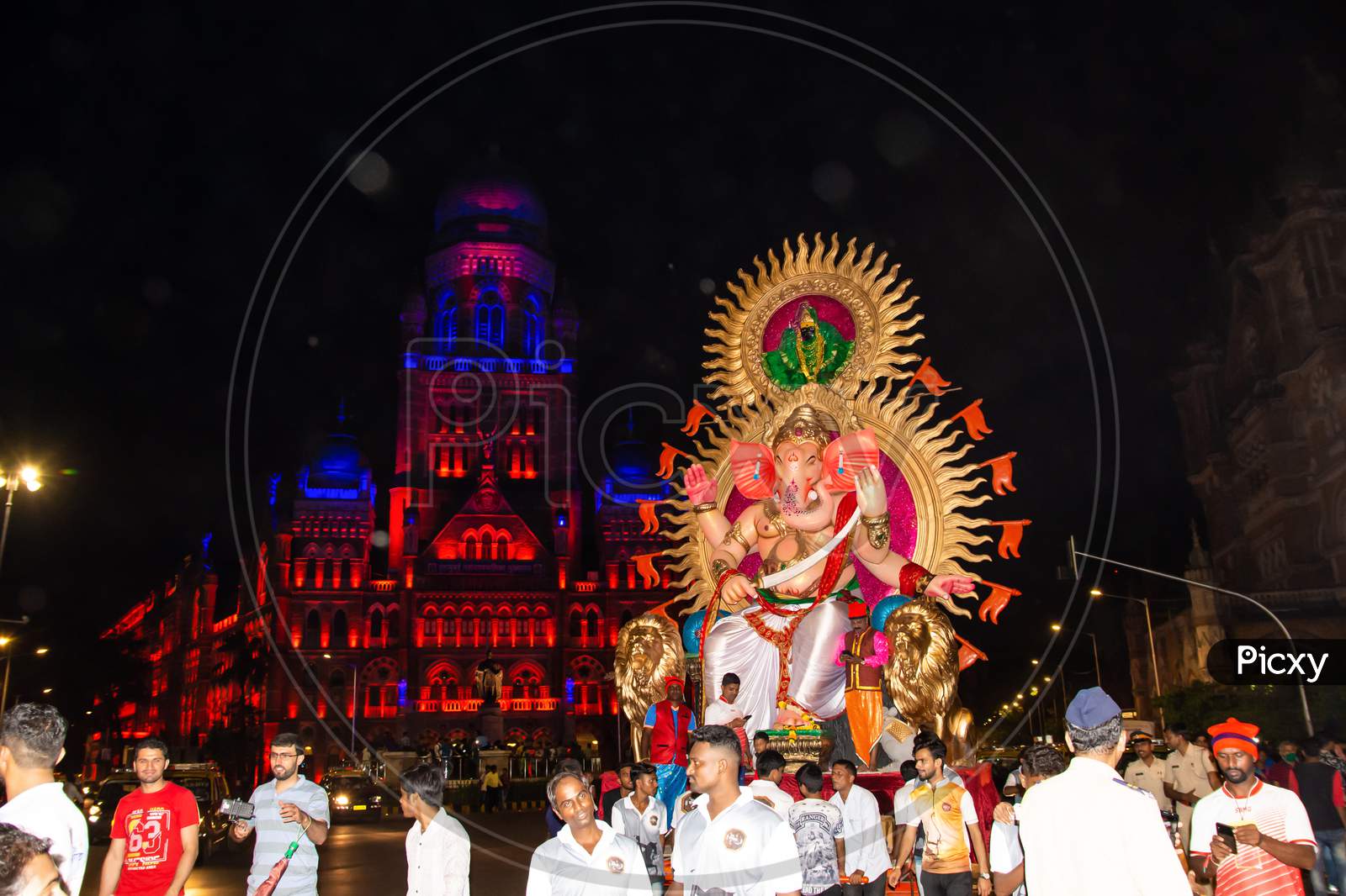 People celebrating Ganesh Chaturthi festival in Mumbai city, India.