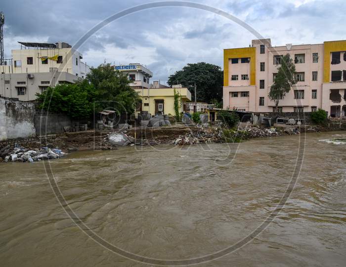 flood water flowing through the drainage in Nayeem Nagar, Warangal, August 18, 2020