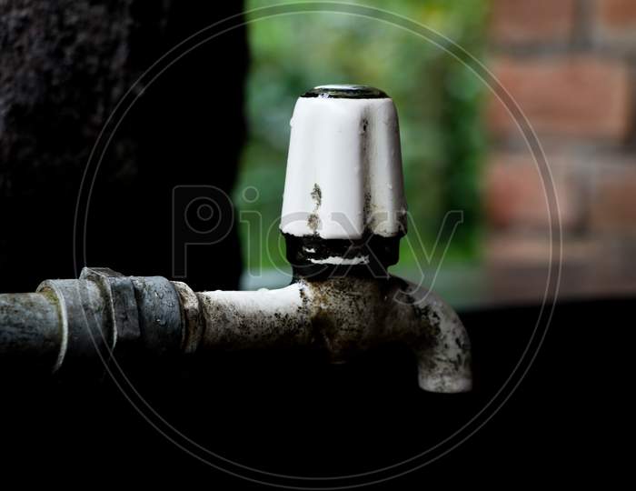 Old Plastic Water Tap In A Village House