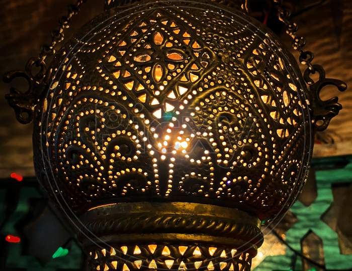 Lantern with intricate and detailed carvings.