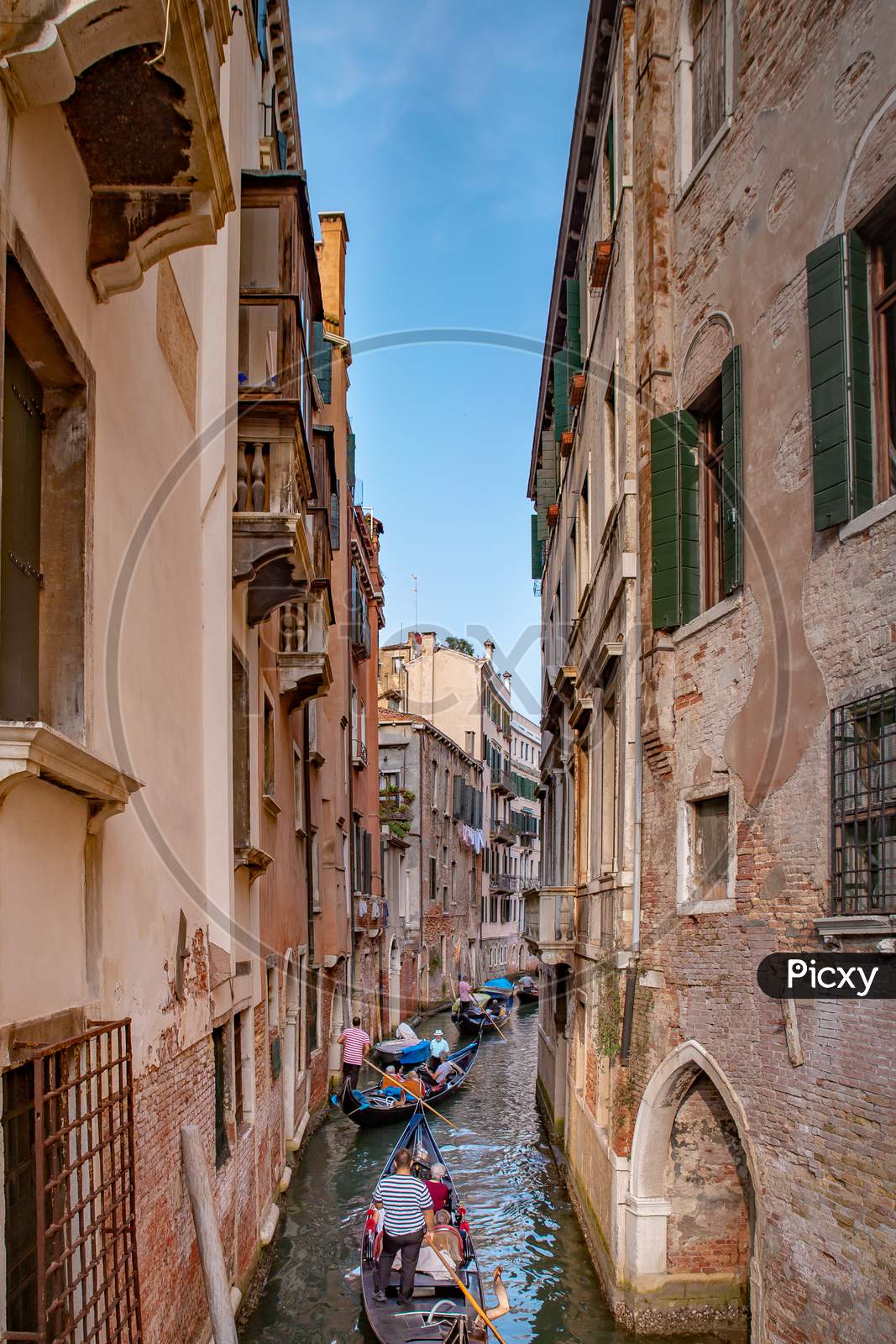 Beautiful Venetian Street In Summer Day, Italy - Gondola Riders