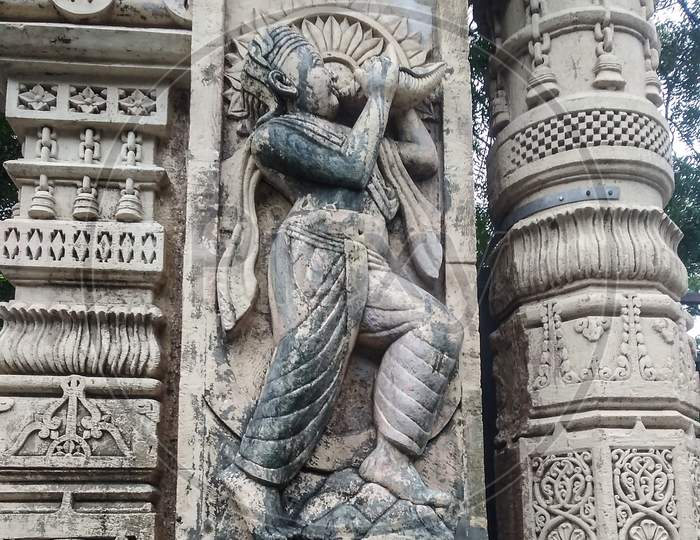Old statue Krishna