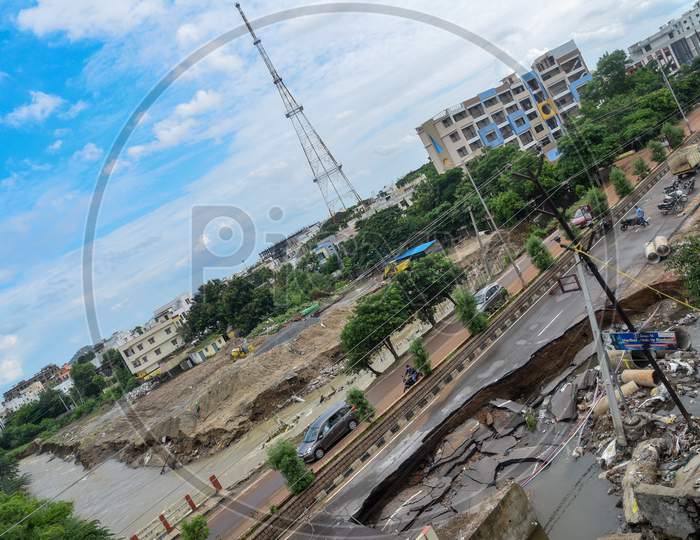 A part of the 100 Ft. Road in Hanamkonda shrinks and washes away after a heavy flood. Hanamkonda, Warangal, August 18, 2020.