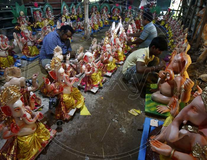 Artists giving final touch to idols of Lord Ganesha ahead of Ganesh Chaturthi festival in Chandigarh, August 20, 2020