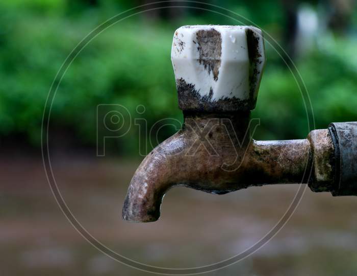 Old Plastic Water Tap In A Village House