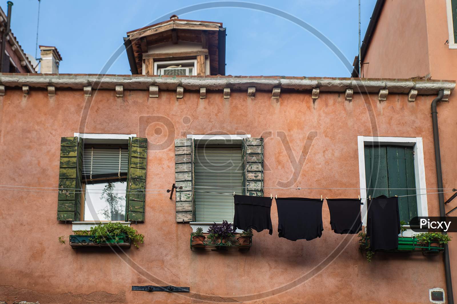 Laundry Hanging Over A Rope In A Traditional Italian European House - Venice