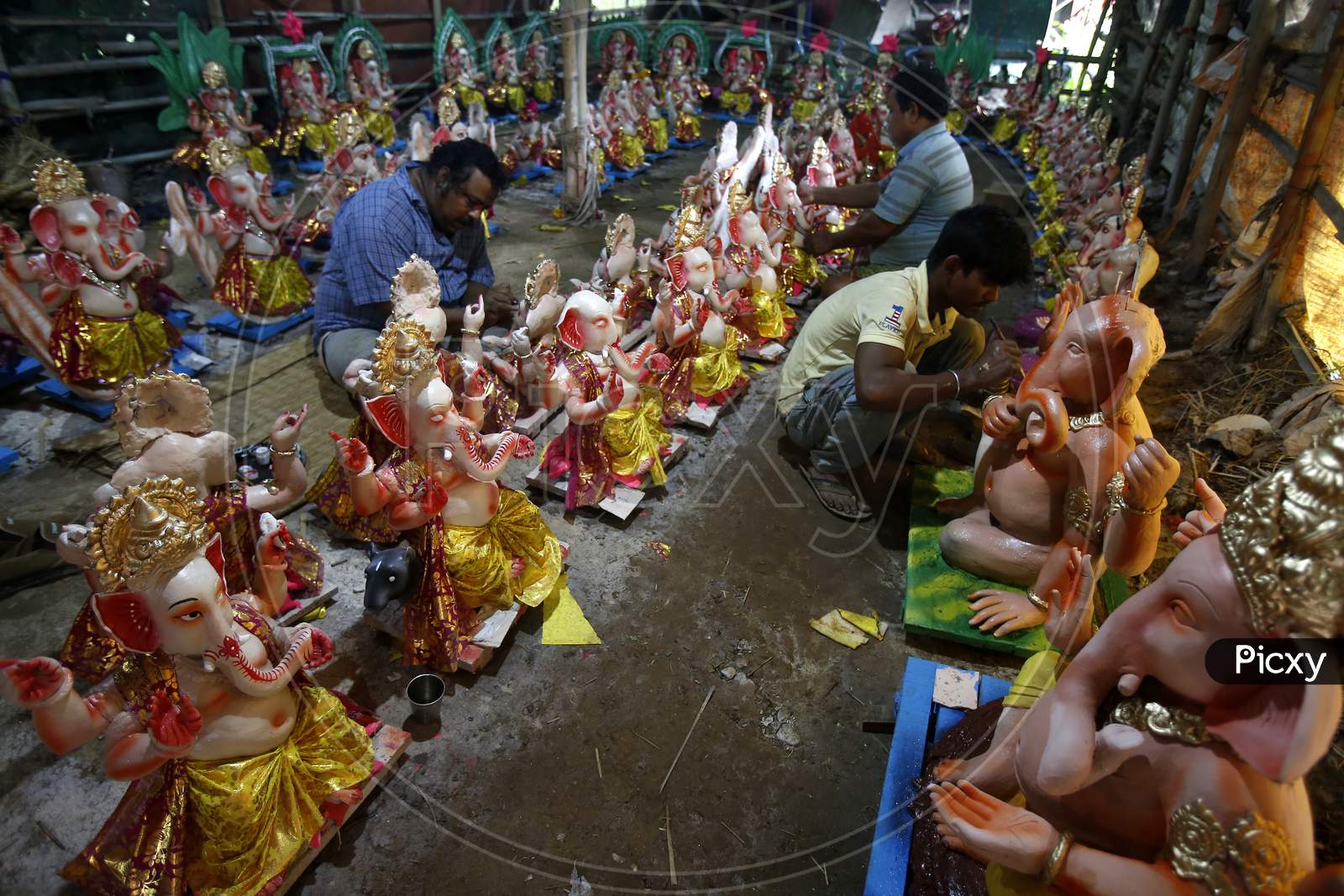 Artists giving final touch to idols of Lord Ganesha ahead of Ganesh Chaturthi festival in Chandigarh, August 20, 2020