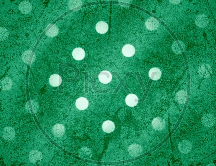 White dots on green abstract background