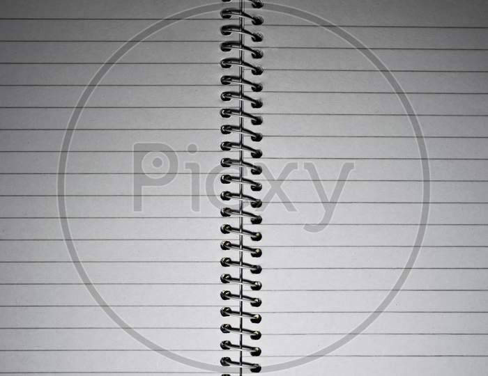 A Binded Blank White Notebook Page