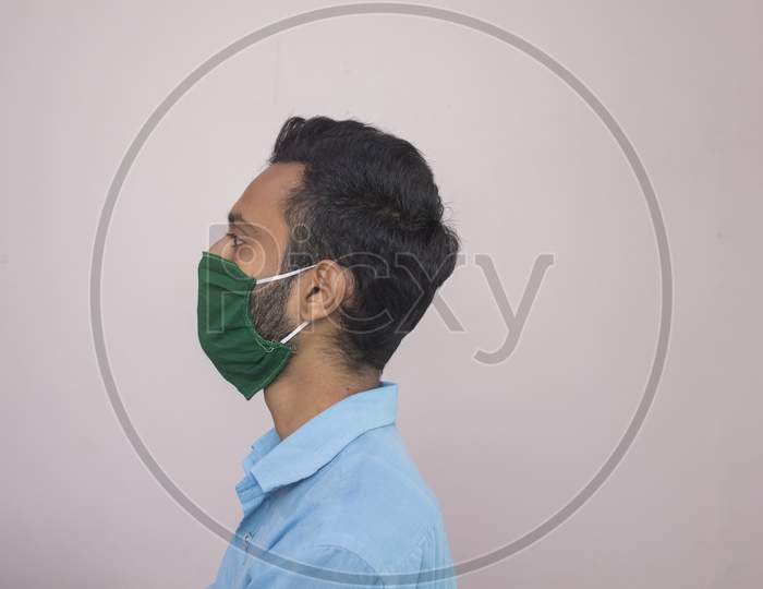Indian Man Wearing Mask Above Nose