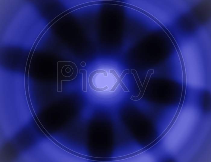 Concentric wheel of radial waves in optical  light. Energy background abstract pattern.