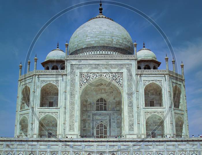 Agra, India - May 12, 2012: Close Up Shot Of Sharply Focused Taj Mahal Monument (A Symbol Of Love) Against Dramatic Blue Sky