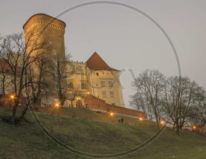 Krakow, Poland - February 21, 2015: Wawel Castle From Below During Night At The End Of Winter Season