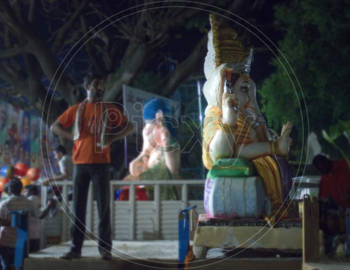 Bangalore, India - September 07, 2016: A Man Stand Next To Ganesha God Statue ( Big Sculpture ) For Immersion Purposes At The End Of Ganesha Chaturthi Hindu Festival
