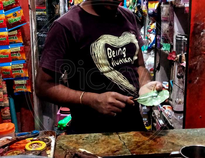 Local Boy Making Pan At Masala Shop.