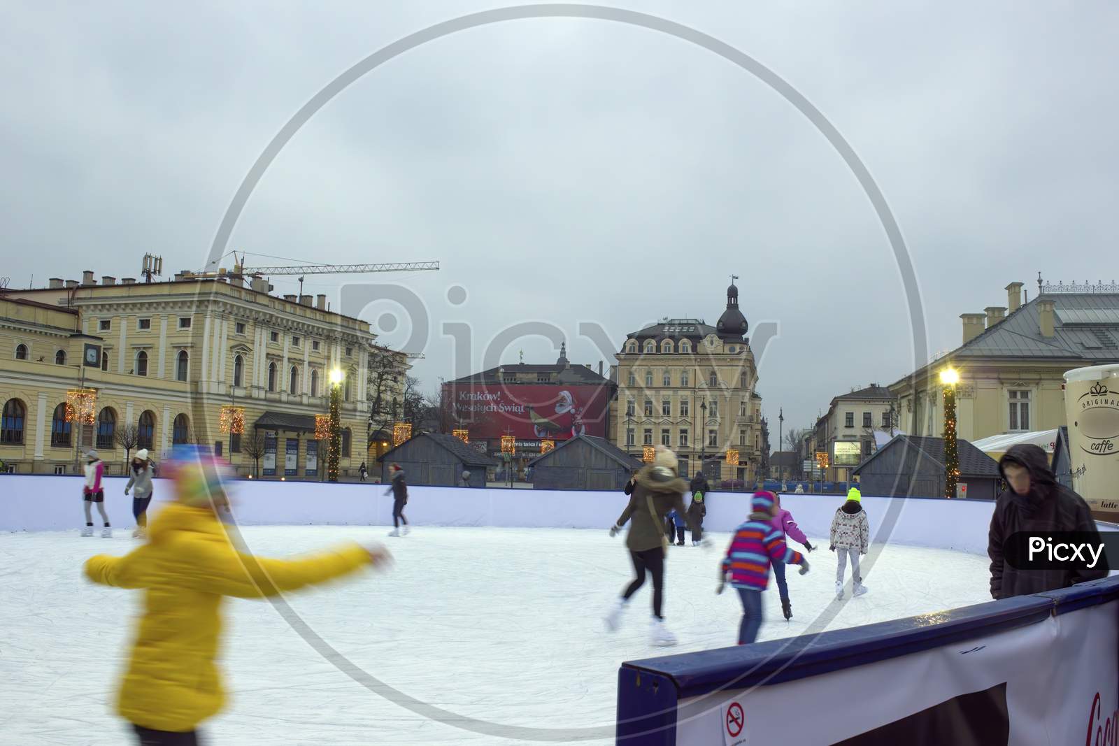 Krakow, Poland - November 30, 2014: Kids Enjoying Ice Skate During Christmas Even Holidays In Winter At City Center Mains Square Before Galeria Krakowska Shoppping Mall