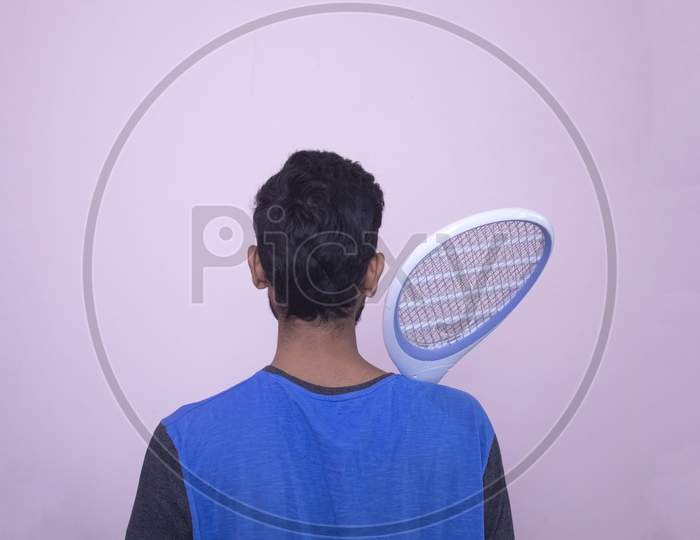 Man With Electric Mosquito Kill Racket, Bug Zapper