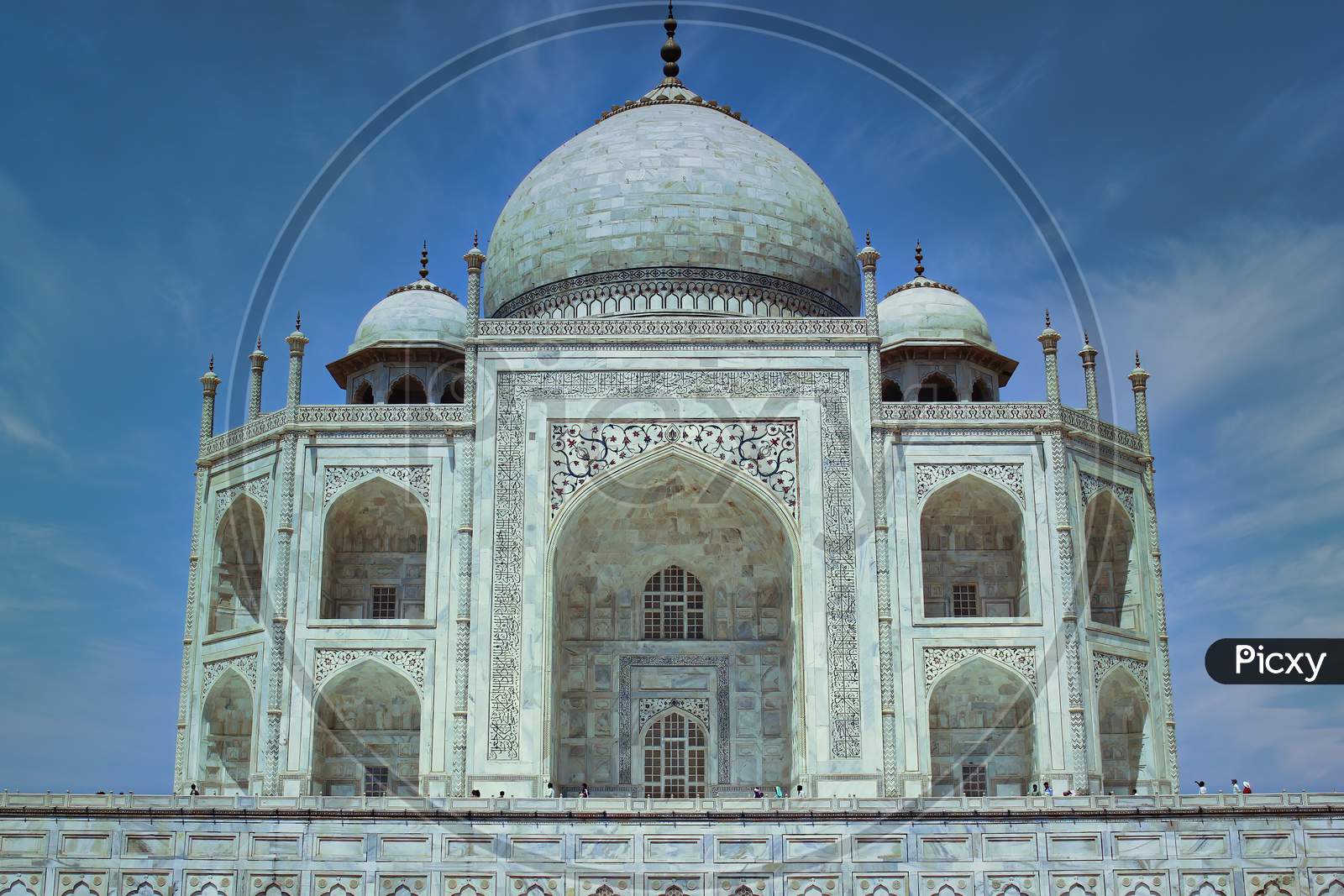 Agra, India - May 12, 2012: Close Up Shot Of Sharply Focused Taj Mahal Monument (A Symbol Of Love) Against Dramatic Blue Sky