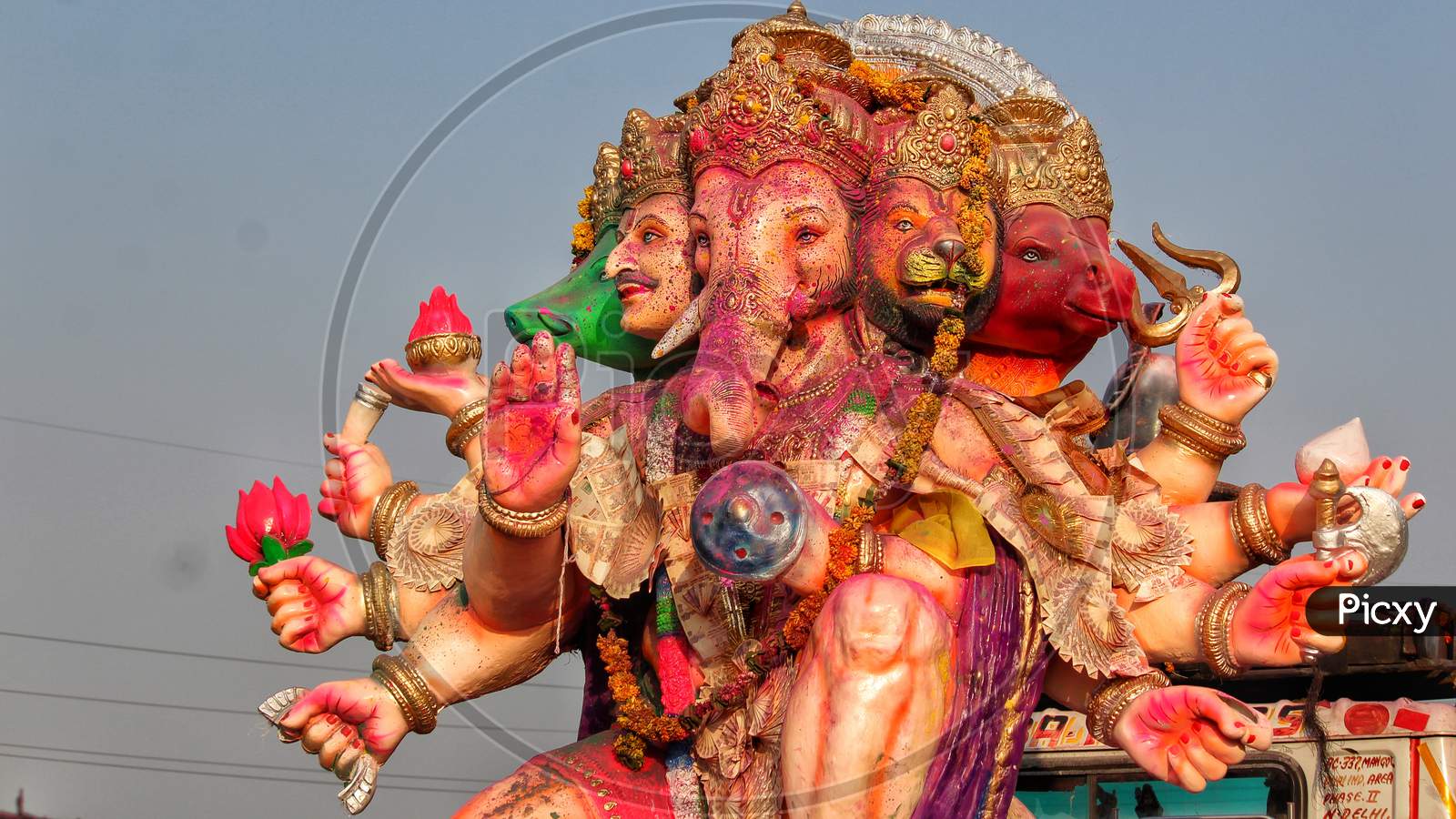 People Carrying Hindu God Idol Ganesh For Holy Immersion (Ganpati Visharjan) At The Ganges River