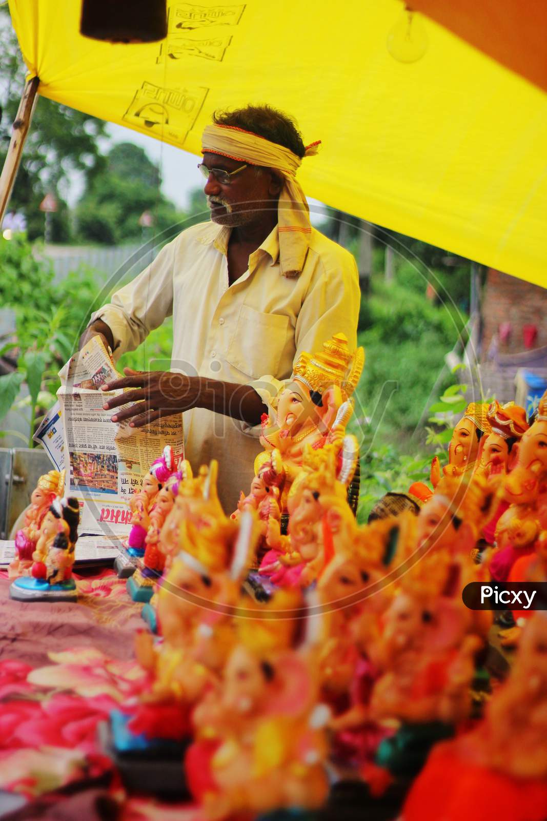 Shop Vendor Of Idols Of Lord Ganesha Selling Idols