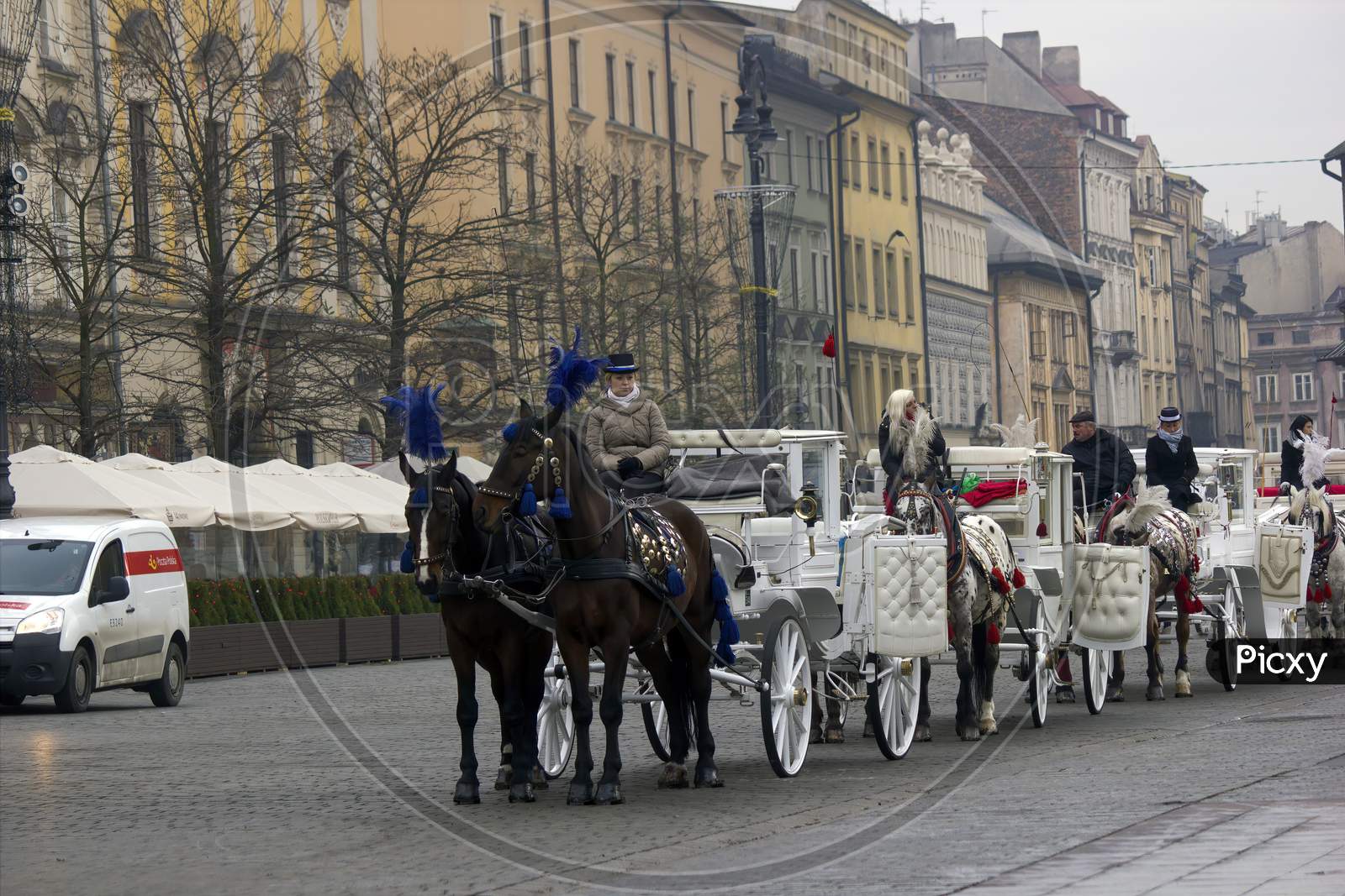 Krakow, Poland - December 16, 2014: Queue Of Horse Ride Carriage For Tourists During Christmas Eve In Winter